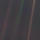 Earth from the edge of the solar system, visible as a minuscule pale blue dot in the center of the right-most brown stripe.NASA, Voyager 1